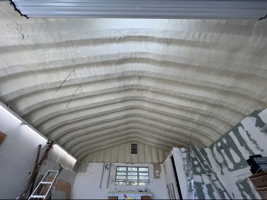 Spray polyurethane foam applied to the underside of a metal roof deck in Hailey